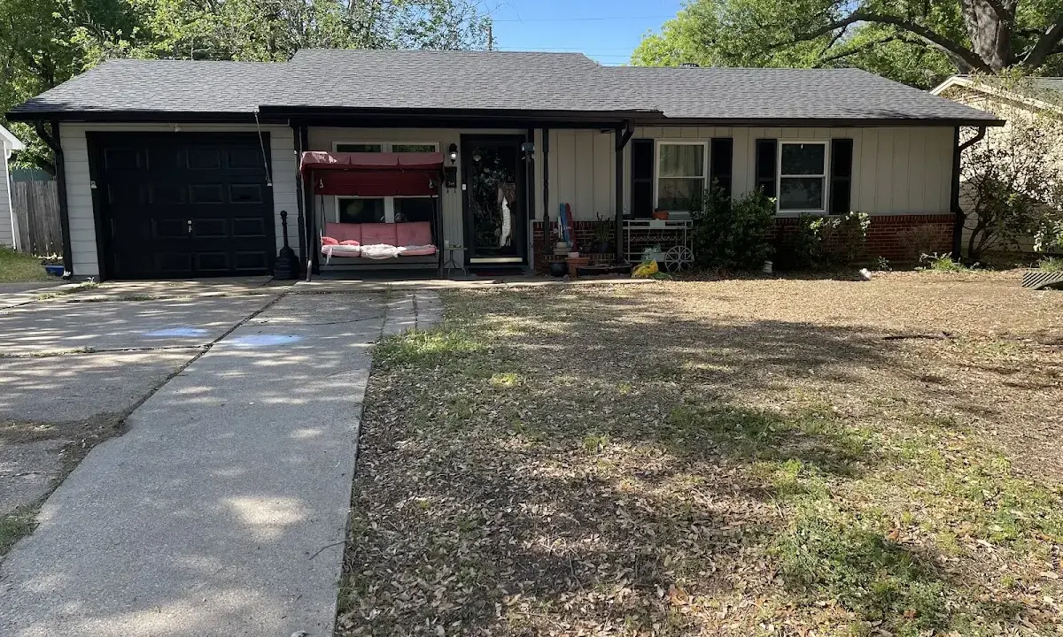 Wind Damage Roof Repair crew at work on a residential roof in Smiths Station